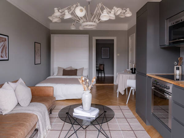 Стильная маленькая квартира с кожаным диваном и кроватью в шкафу (38 кв. м) Стильная маленькая квартира с кожаным диваном и кроватью в шкафу (38 кв. м)