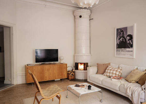 Арочные окна и тёплые оттенки: квартира на первом этаже в Стокгольме (66 кв. м) Арочные окна и тёплые оттенки: квартира на первом этаже в Стокгольме (66 кв. м)