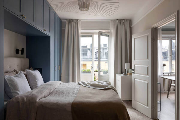 Серый потолок и библиотека: элегантная квартира с изюминкой в Стокгольме (69 кв. м) Серый потолок и библиотека: элегантная квартира с изюминкой в Стокгольме (69 кв. м)